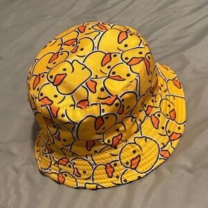 Super cute bucket sun hat with yellow ducky pattern, not sized for kids